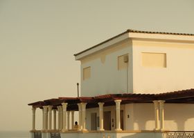 A House That Holds the Evening